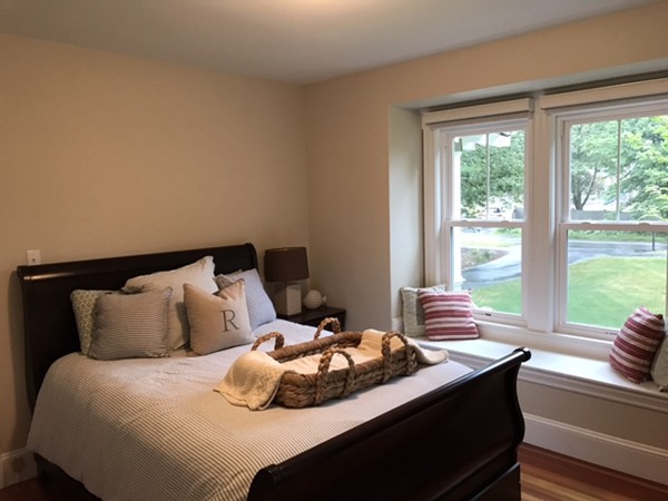 44 Prospect Street Acton, MA 01720 - Photo 14 of 25 a bedroom with a bed and a large window