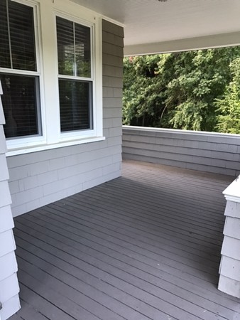 44 Prospect Street Acton, MA 01720 - Photo 23 of 25 a view of a balcony from a window