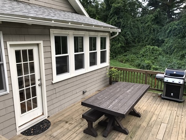 44 Prospect Street Acton, MA 01720 - Photo 24 of 25 a view of a deck with wooden floor and seating space