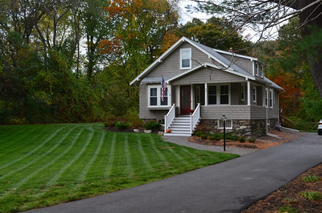 44 Prospect Street Acton, MA 01720 - Photo 25 of 25 a front view of a house with yard and green space
