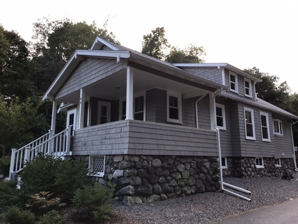 44 Prospect Street Acton, MA 01720 - Photo 3 of 25 a front view of a house with a yard