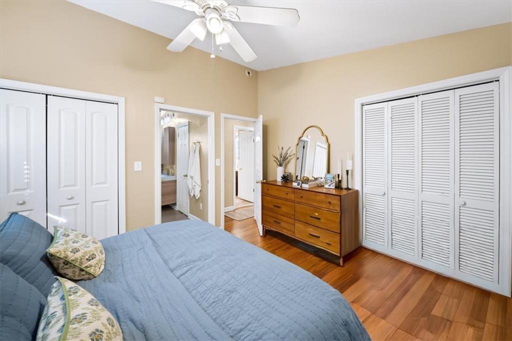 109 Spruell Springs Road Atlanta, GA 30342 - Photo 12 of 34 a bedroom with a bed and a dresser