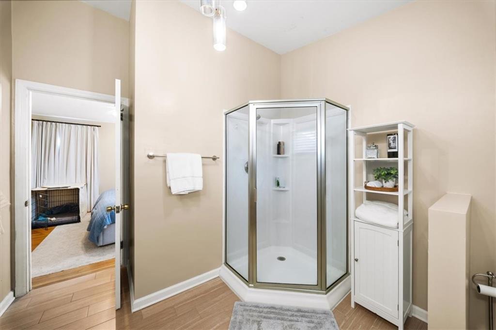 109 Spruell Springs Road Atlanta, GA 30342 - Photo 16 of 34 a bathroom with a shower