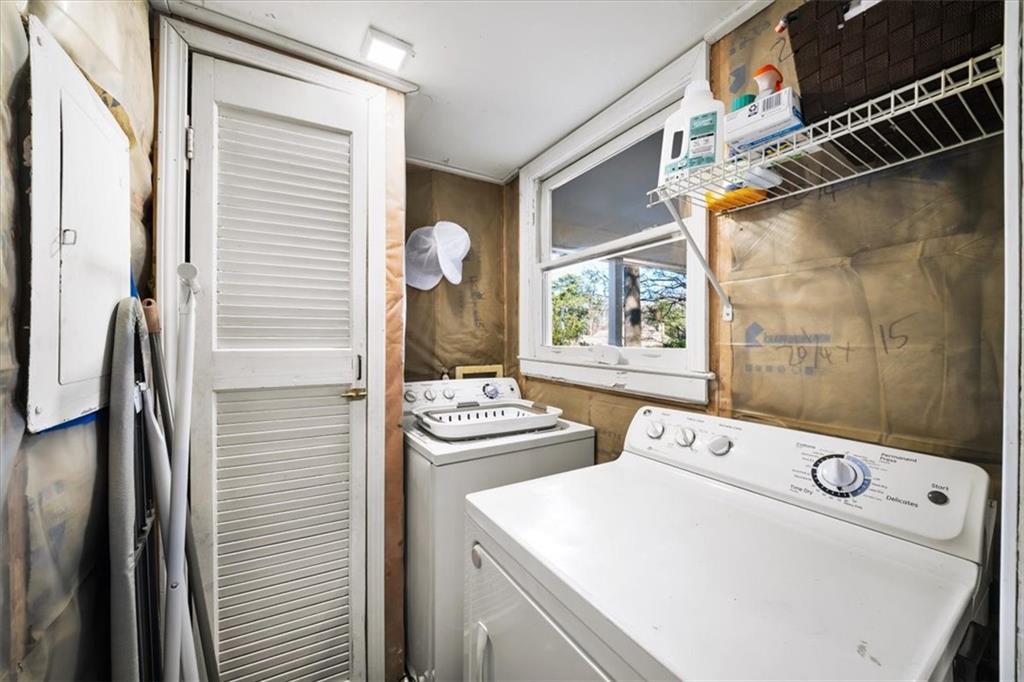 109 Spruell Springs Road Atlanta, GA 30342 - Photo 23 of 34 a utility room with dryer and washer