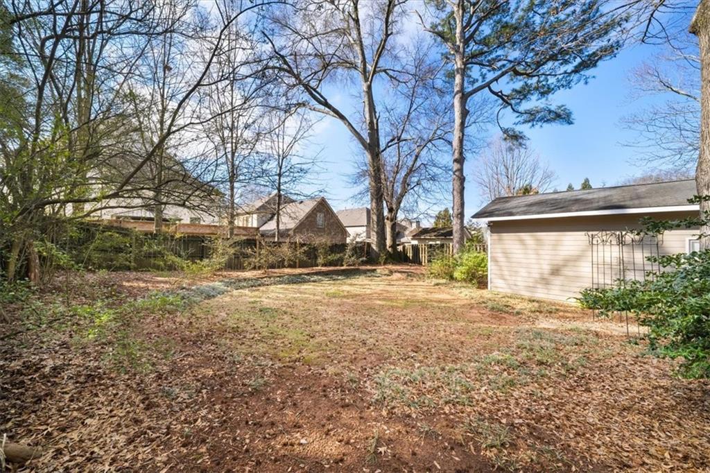 109 Spruell Springs Road Atlanta, GA 30342 - Photo 30 of 34 a view of back yard of the house