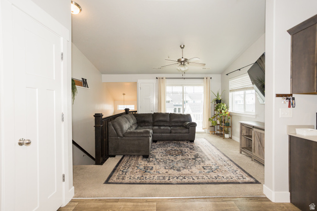 2452 West 500 South, Unit 2 Springville, UT 84663 - Photo 6 of 23 Open-concept living area with vaulted ceilings and a ceiling fan
