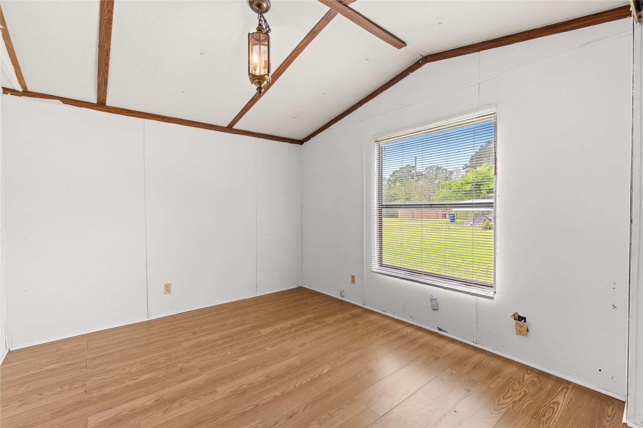 370 Lakeside Drive Trinity, TX 75862 - Photo 9 of 23 a view of an empty room with a window