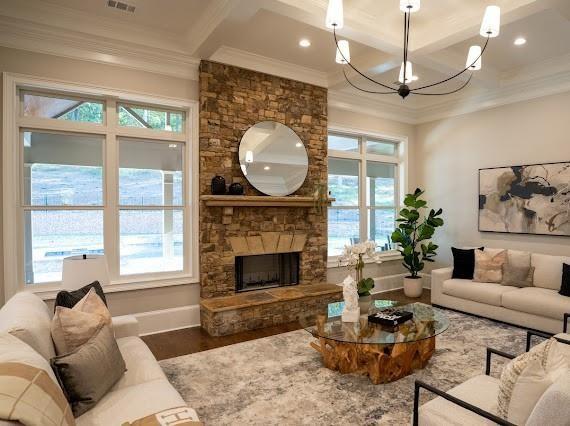Undisclosed Address Athens, GA 30607 - Photo 15 of 85 a living room with furniture a fireplace and a floor to ceiling window