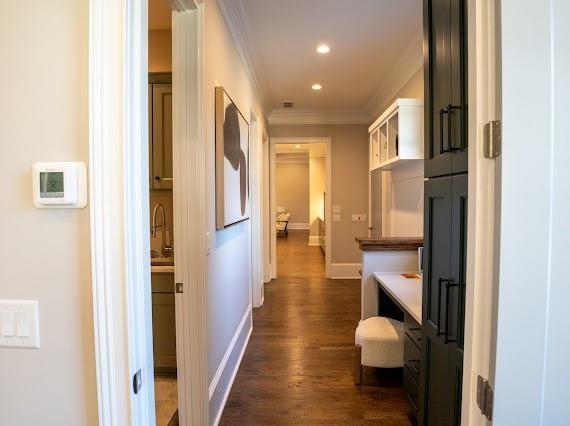Undisclosed Address Athens, GA 30607 - Photo 40 of 85 a view of a hallway with wooden floor and a bathroom