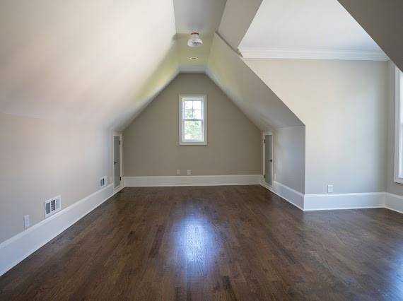Undisclosed Address Athens, GA 30607 - Photo 52 of 85 an empty room with wooden floor and windows