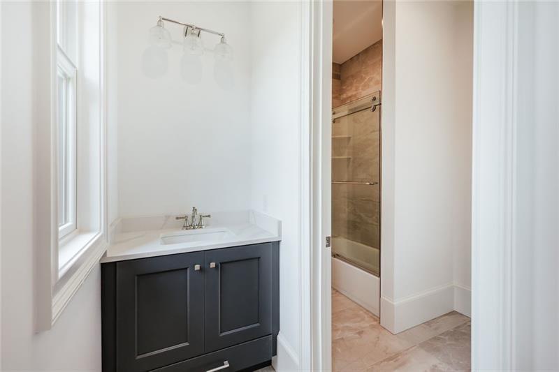 Undisclosed Address Athens, GA 30607 - Photo 55 of 85 a bathroom with a sink and mirror