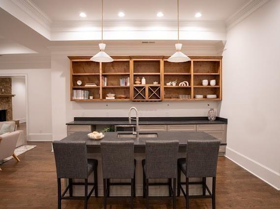 Undisclosed Address Athens, GA 30607 - Photo 59 of 85 a kitchen with a dining table chairs stainless steel appliances and cabinets