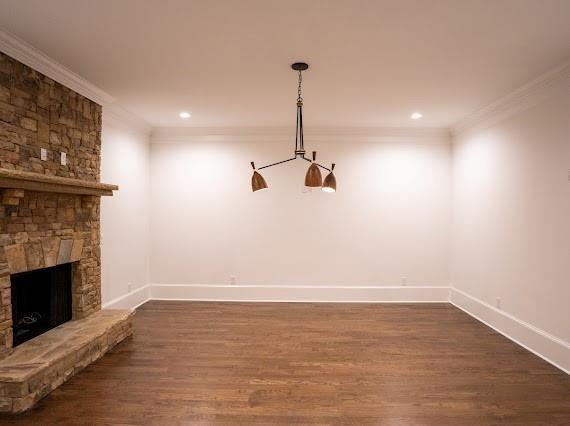 Undisclosed Address Athens, GA 30607 - Photo 61 of 85 a view of a room with wooden floor a fireplace and window