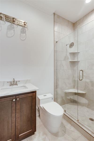 Undisclosed Address Athens, GA 30607 - Photo 84 of 85 a bathroom with a granite countertop sink a toilet and shower