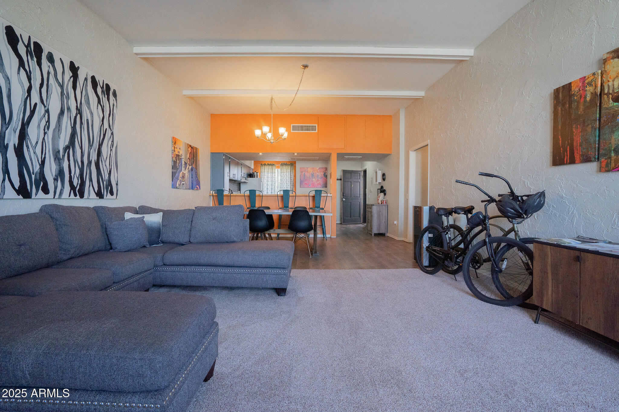 3314 North 68th Street, Unit 201 Scottsdale, AZ 85251 - Photo 13 of 29 a living room with furniture and a large window