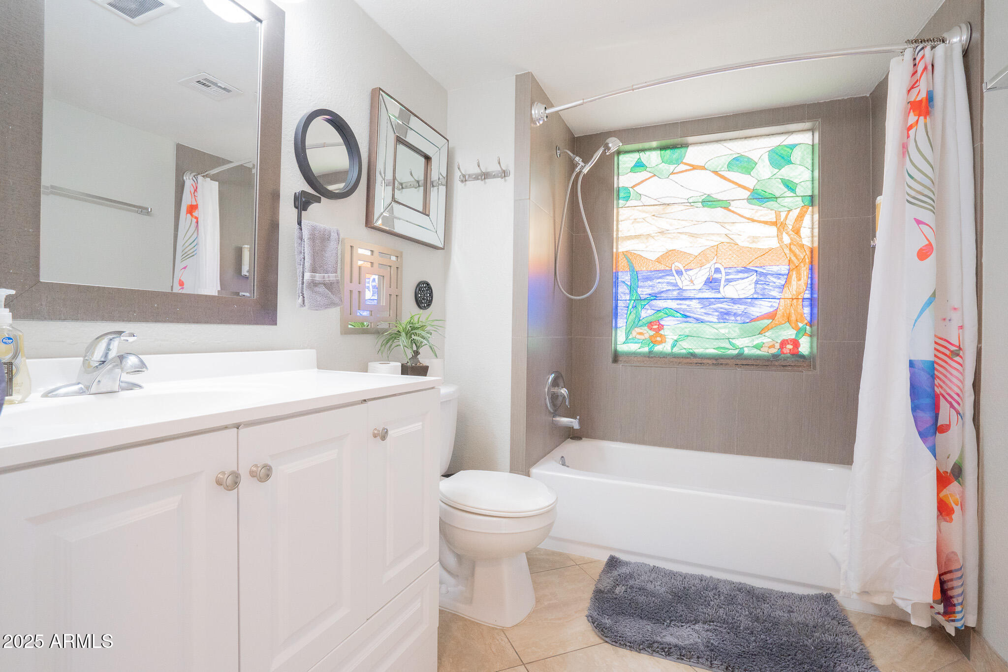 3314 North 68th Street, Unit 201 Scottsdale, AZ 85251 - Photo 17 of 29 a bathroom with a sink a toilet and a bathtub