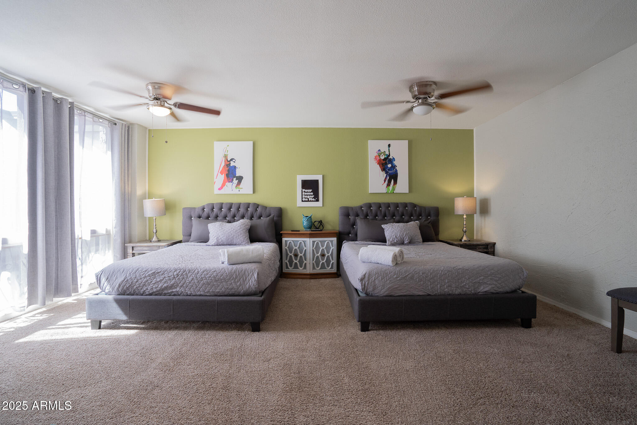 3314 North 68th Street, Unit 201 Scottsdale, AZ 85251 - Photo 24 of 29 a bedroom with a bed couch and window