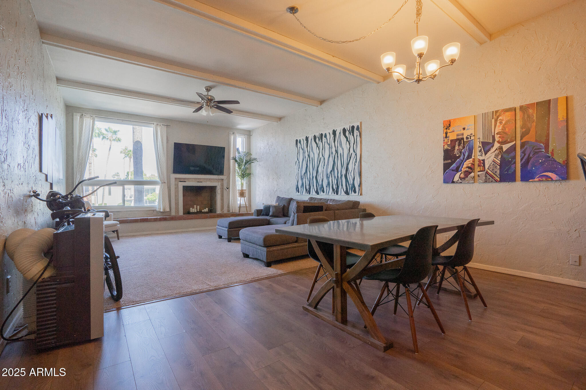 3314 North 68th Street, Unit 201 Scottsdale, AZ 85251 - Photo 4 of 29 a view of a dining room with furniture and wooden floor