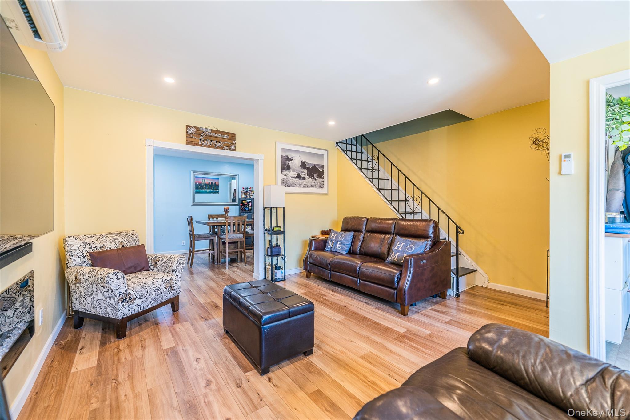 89-32 90th Street Queens, NY 11421 - Photo 11 of 33 Living area featuring light wood finished floors and recessed lighting