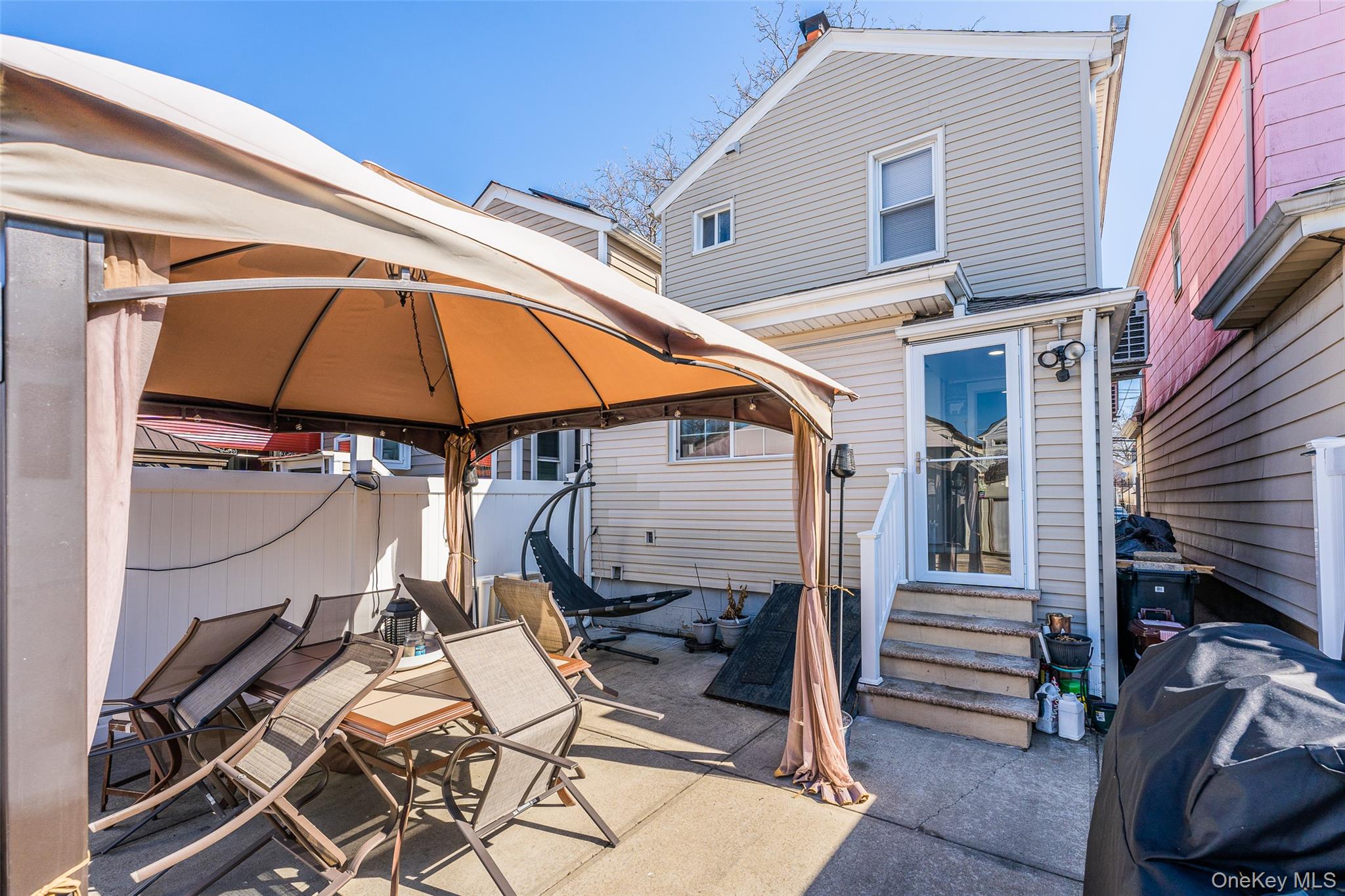 89-32 90th Street Queens, NY 11421 - Photo 21 of 33 View of patio with a gazebo, grilling area, and entry steps