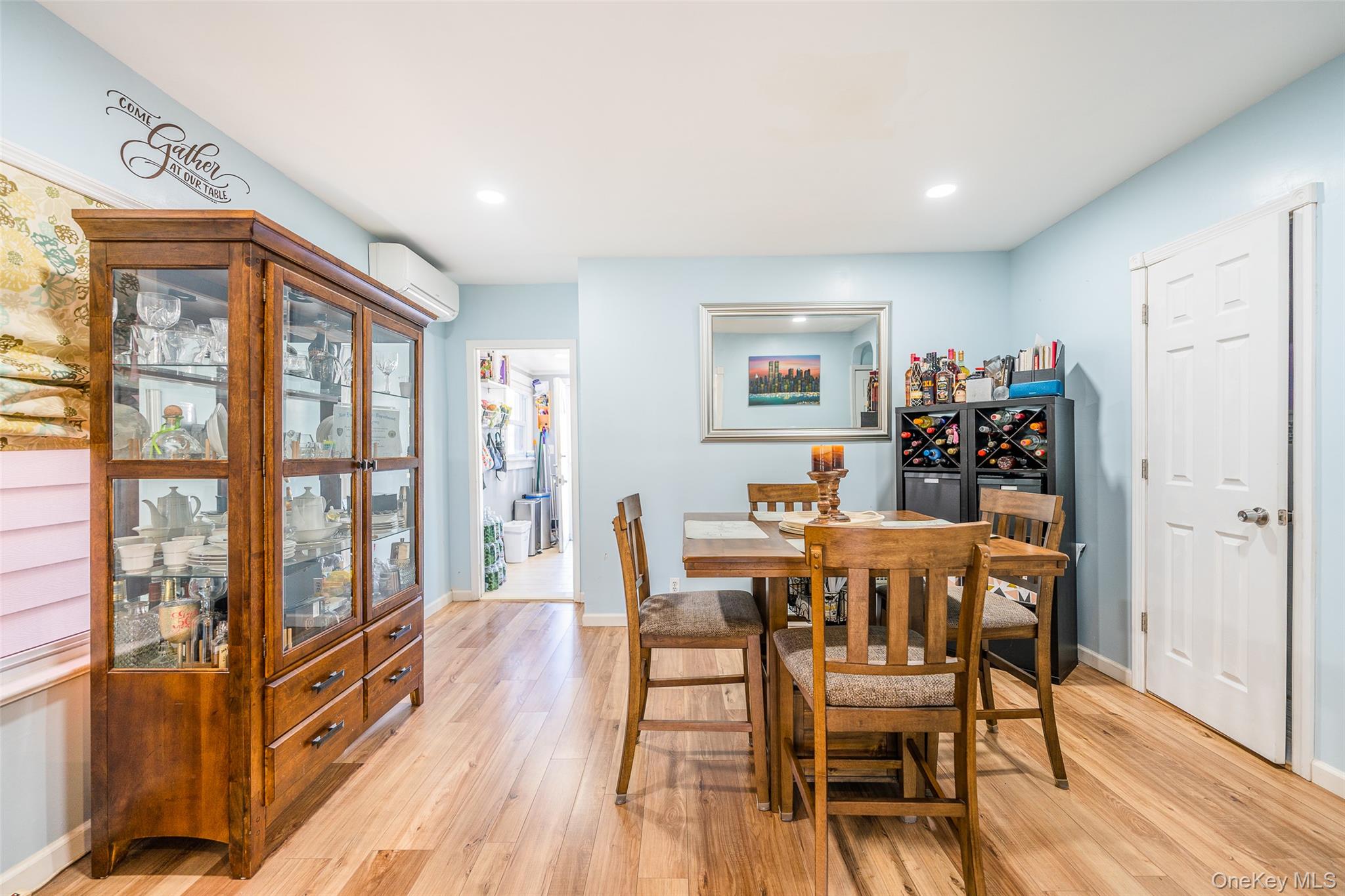 89-32 90th Street Queens, NY 11421 - Photo 8 of 33 Dining area featuring light wood-style floors and recessed lighting