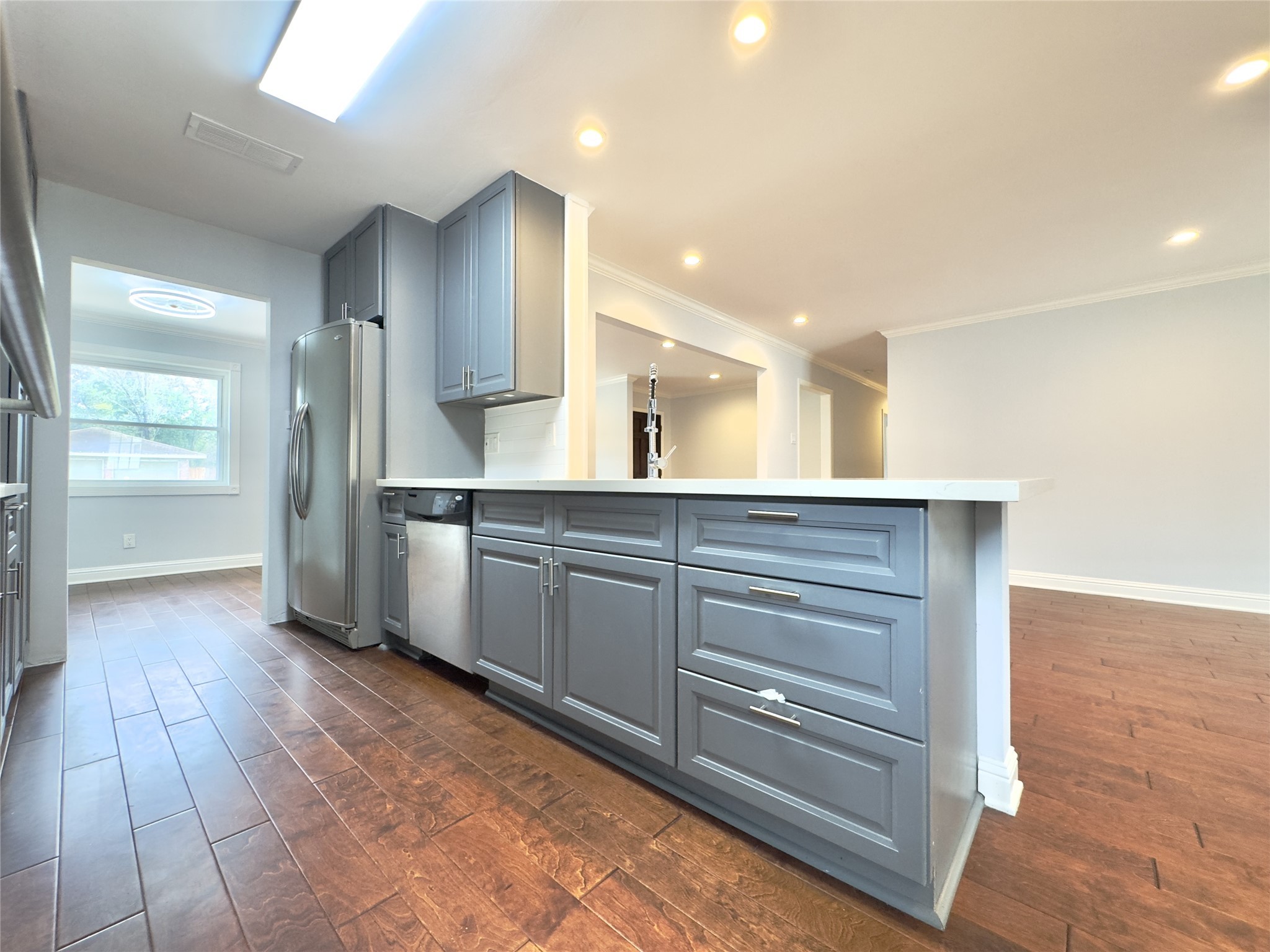 1415 Mapleton Drive Houston, TX 77043 - Photo 27 of 44 a view of a kitchen with cabinets