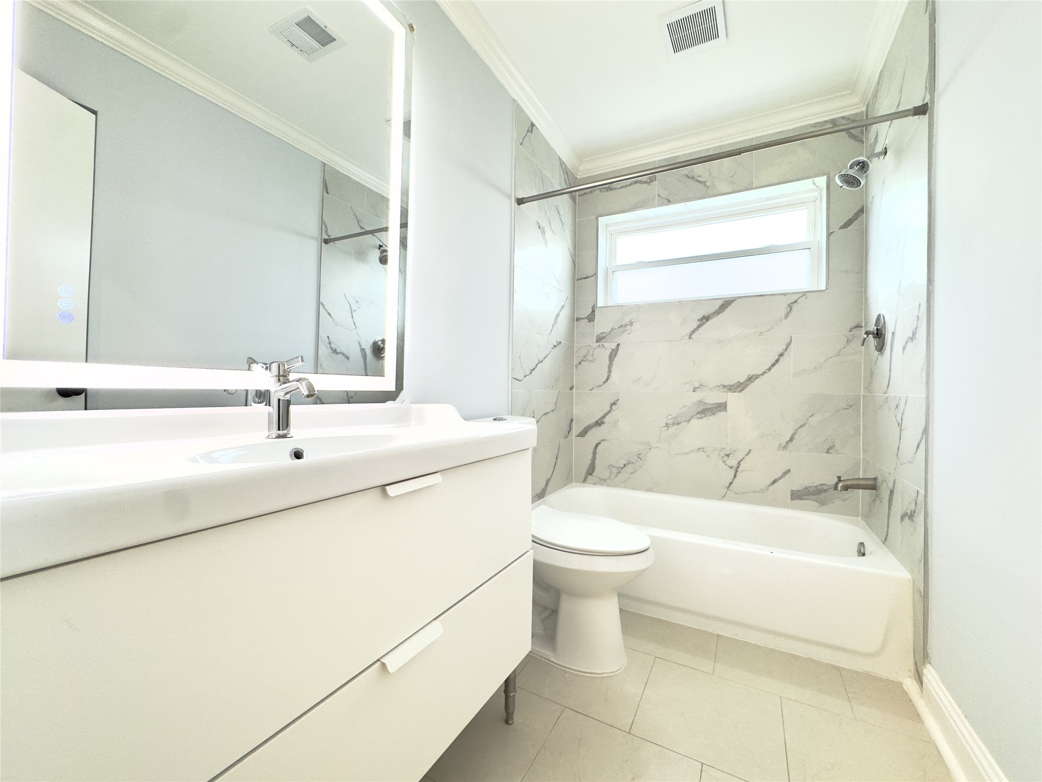 1415 Mapleton Drive Houston, TX 77043 - Photo 29 of 44 a bathroom with a sink a toilet and a bathtub