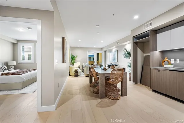 a view of a dining area with furniture window and wooden floor