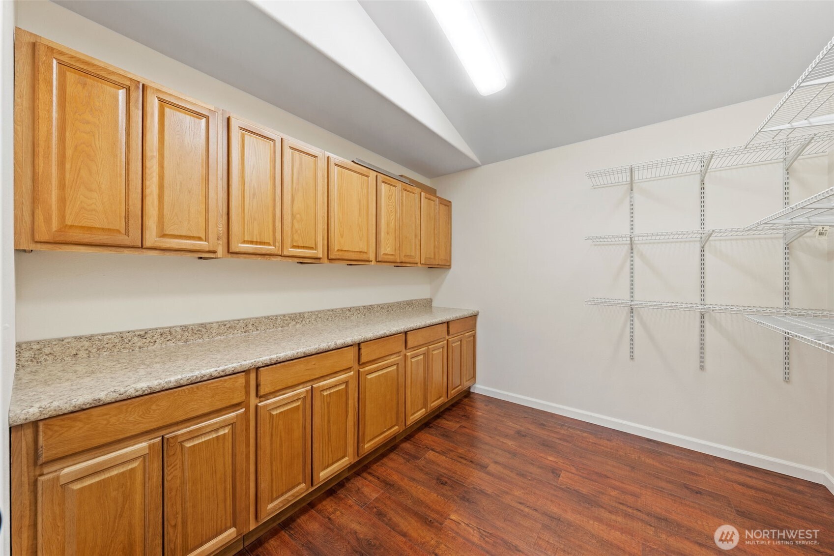 182-51 Burchett Road Onalaska, WA 98570 - Photo 13 of 29 a view of a kitchen with wooden floor
