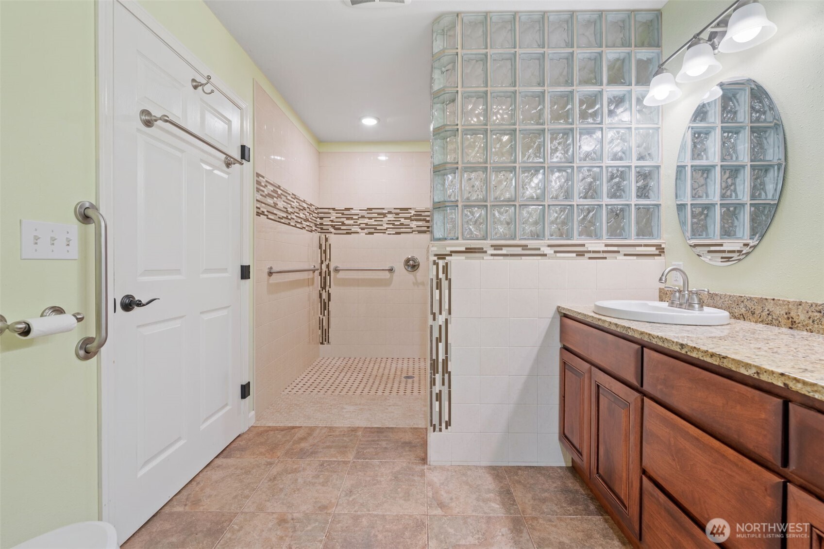 182-51 Burchett Road Onalaska, WA 98570 - Photo 16 of 29 a bathroom with a sink and a mirror