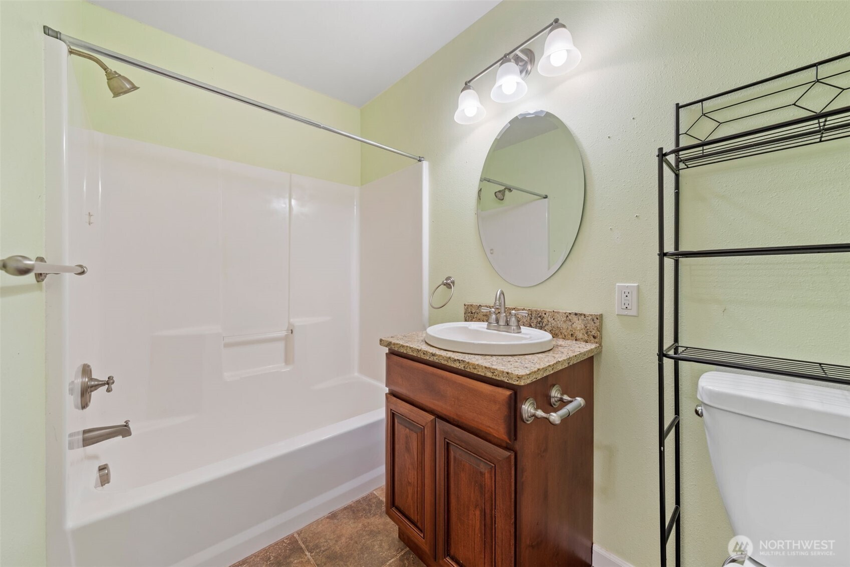 182-51 Burchett Road Onalaska, WA 98570 - Photo 20 of 29 a bathroom with a sink vanity mirror toilet and shower