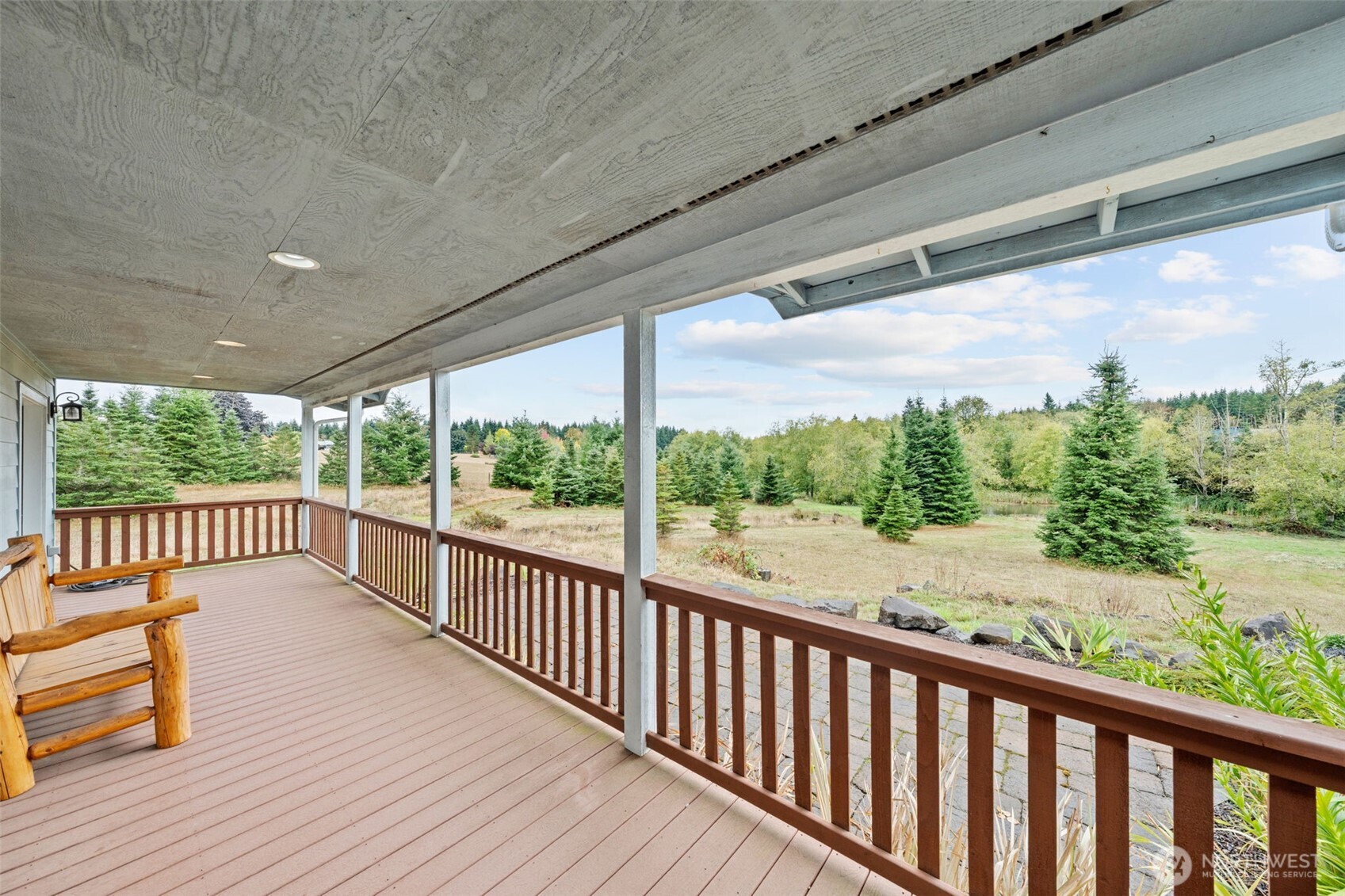 182-51 Burchett Road Onalaska, WA 98570 - Photo 22 of 29 a view of a porch with wooden floor of the house