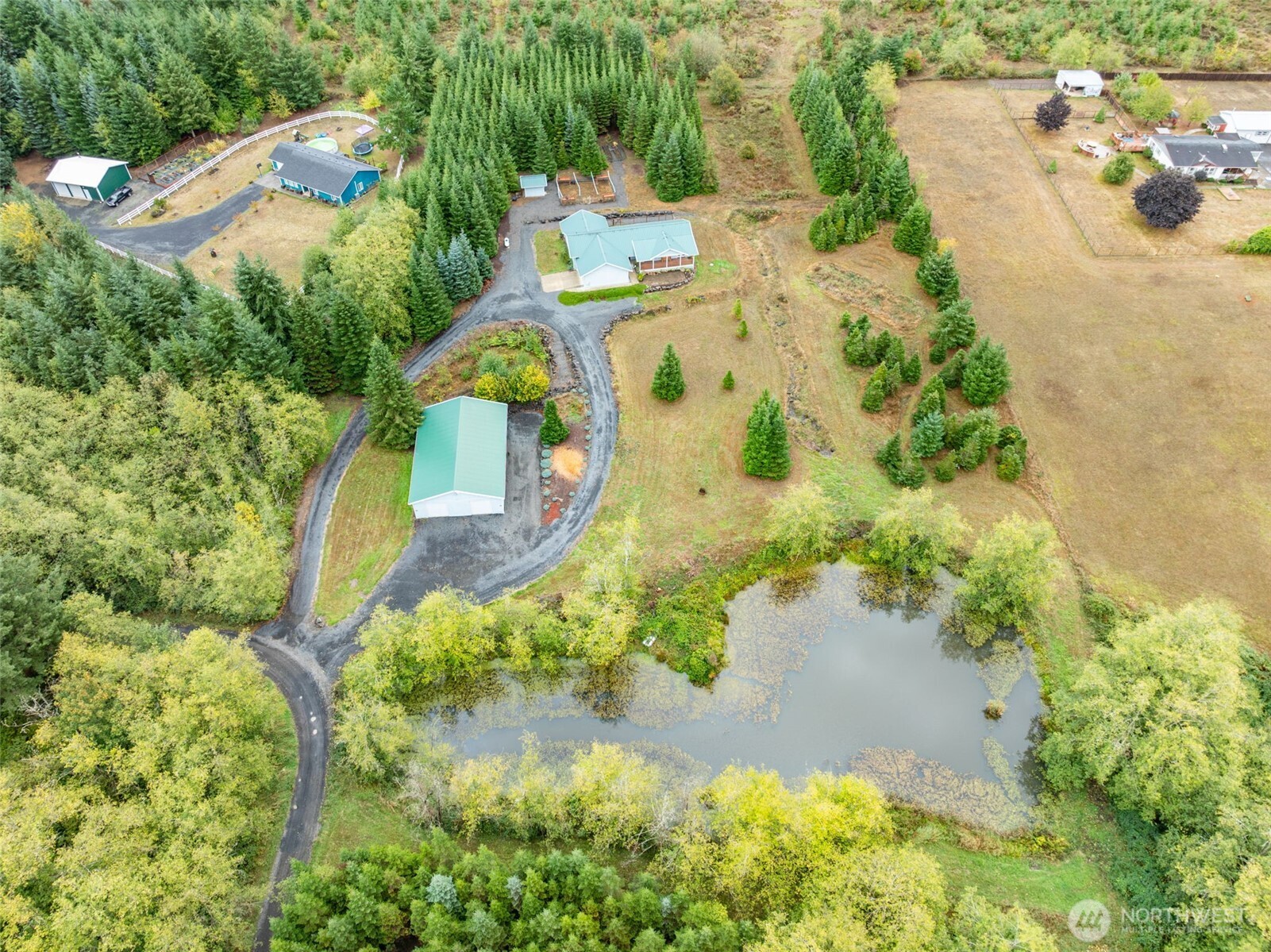 182-51 Burchett Road Onalaska, WA 98570 - Photo 5 of 29 an aerial view of residential house with pool and garden