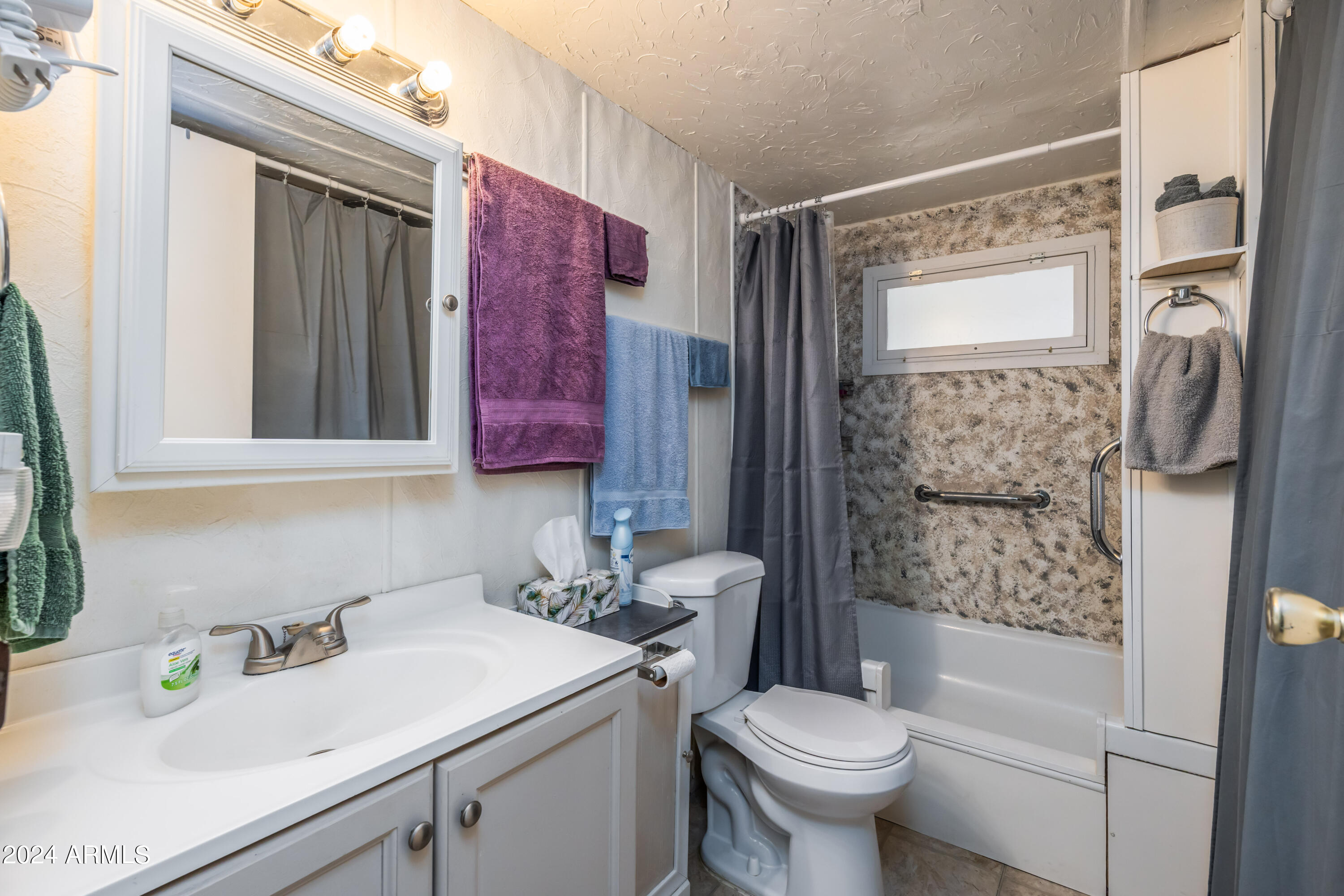 15802 South Gilbert Road, Unit 13 Chandler, AZ 85225 - Photo 20 of 28 5a bathroom & laundry room