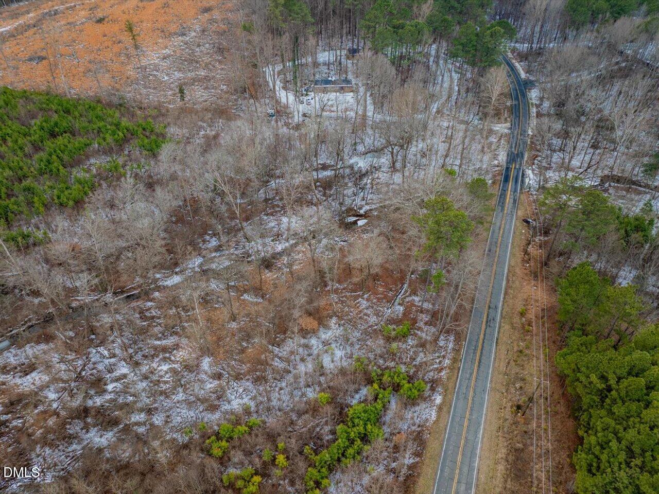 558 Jones Ferry Road Pittsboro, NC 27312 - Photo 3 of 19 a aerial view of a house with a yard