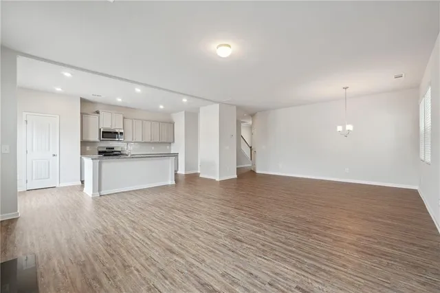 a view of kitchen with wooden floor