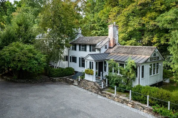 front view of a house with a small yard