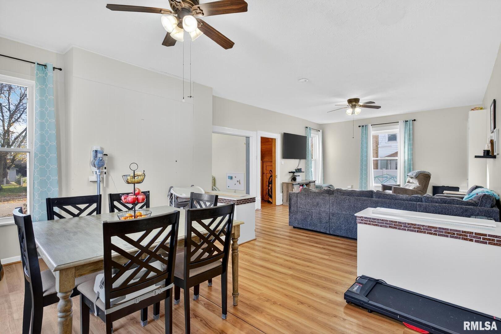 919 9th Avenue Fulton, IL 61252 - Photo 29 of 54 a view of a dining room with furniture and wooden floor