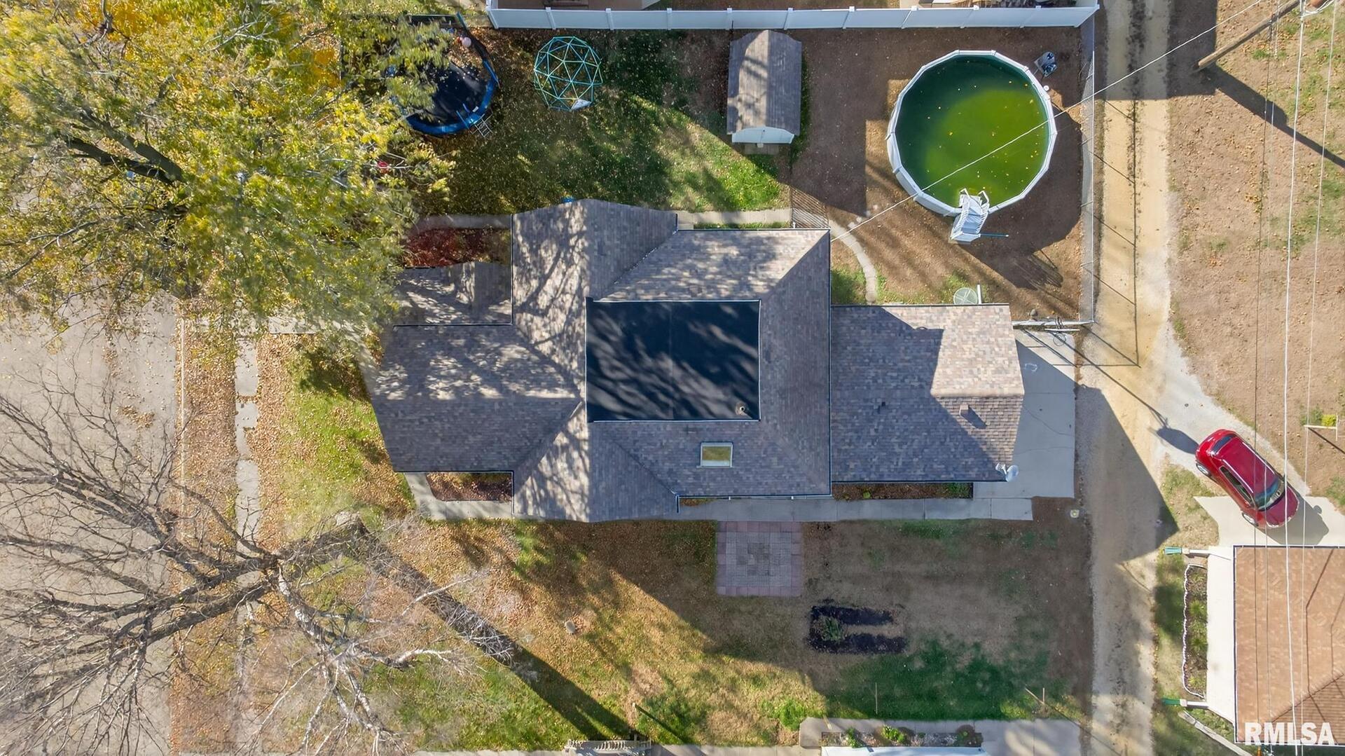919 9th Avenue Fulton, IL 61252 - Photo 3 of 54 an aerial view of a house with a yard basket ball court and outdoor seating