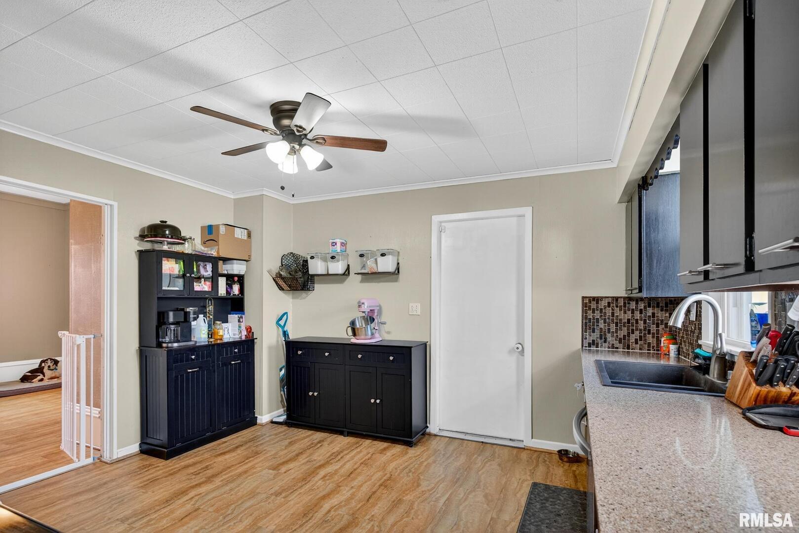 919 9th Avenue Fulton, IL 61252 - Photo 33 of 54 a bed room with a bed and a book shelf