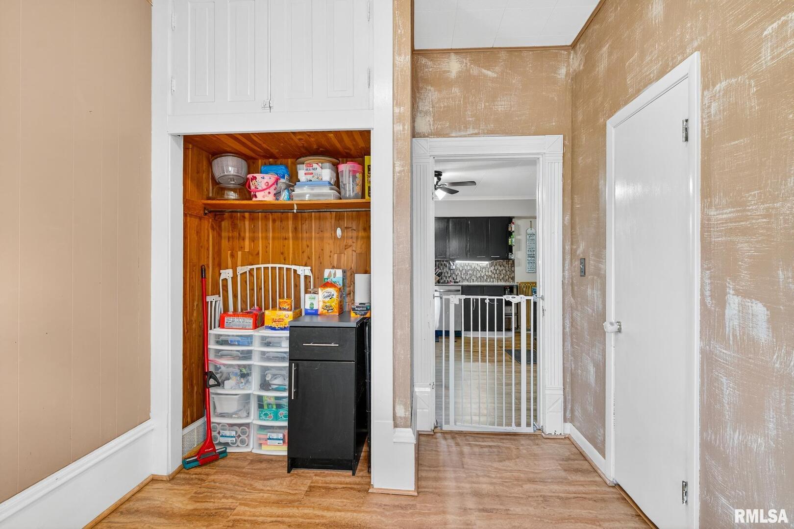 919 9th Avenue Fulton, IL 61252 - Photo 36 of 54 a view of a living room with a wooden floor