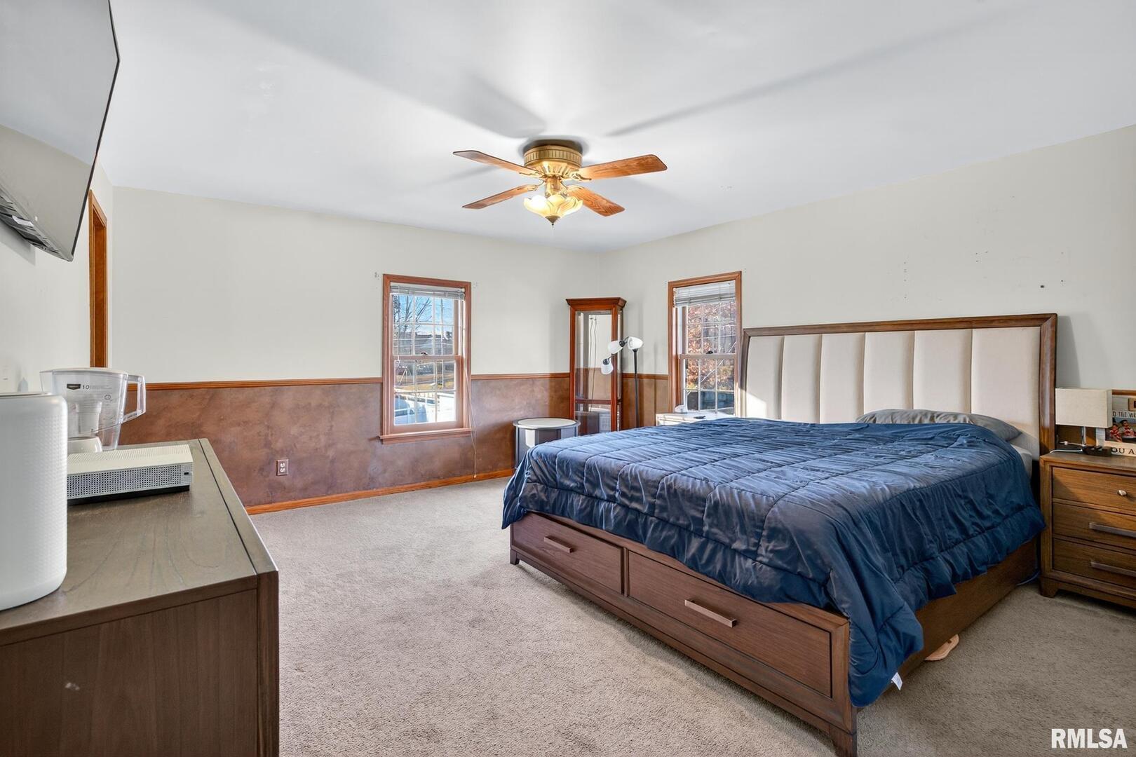 919 9th Avenue Fulton, IL 61252 - Photo 38 of 54 a spacious bedroom with a bed and window