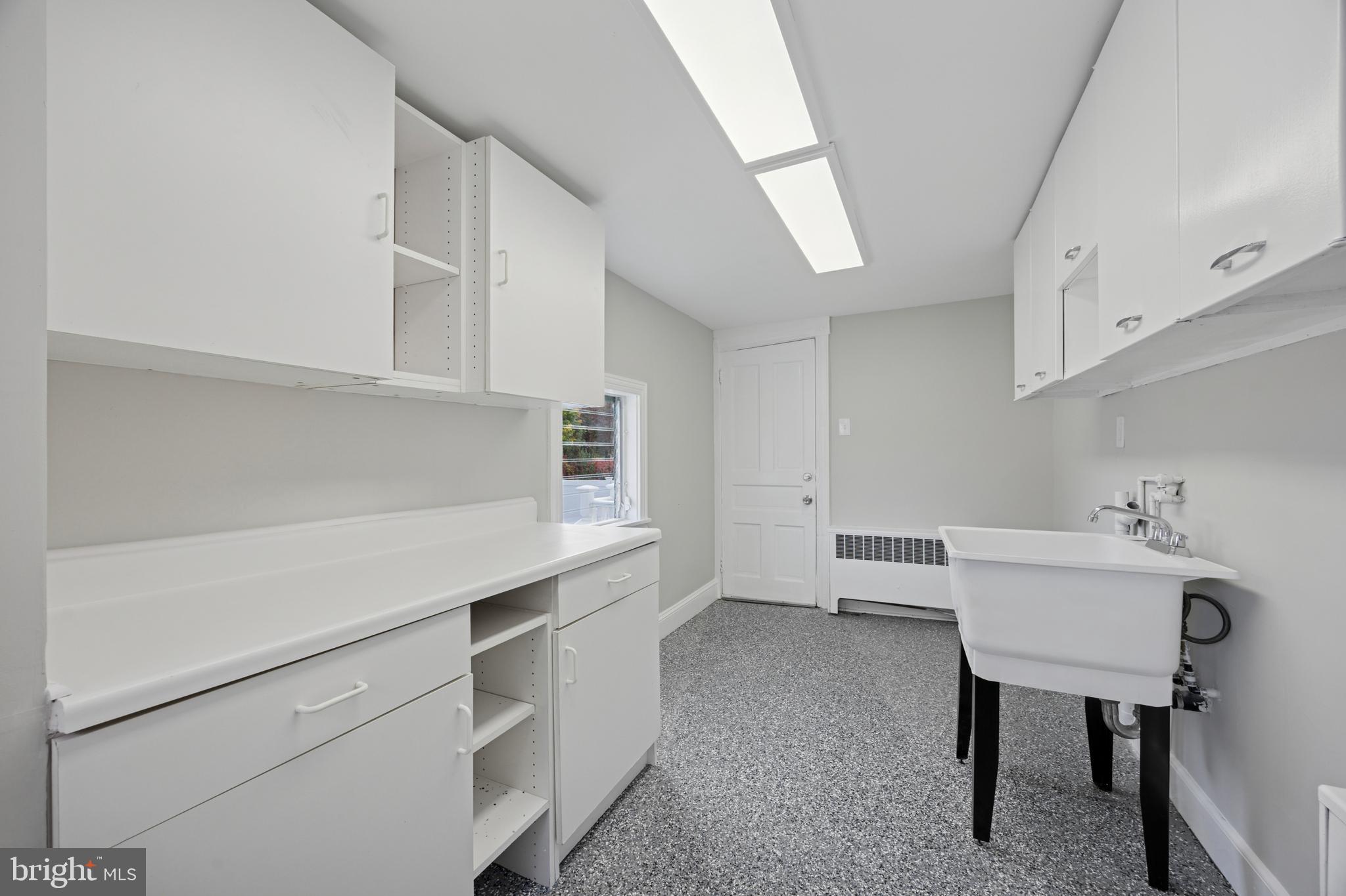 405 North Swarthmore Avenue Ridley Park, PA 19078 - Photo 12 of 35 a view of cabinets and wooden floor