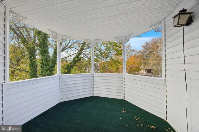 a view of a back yard from a balcony
