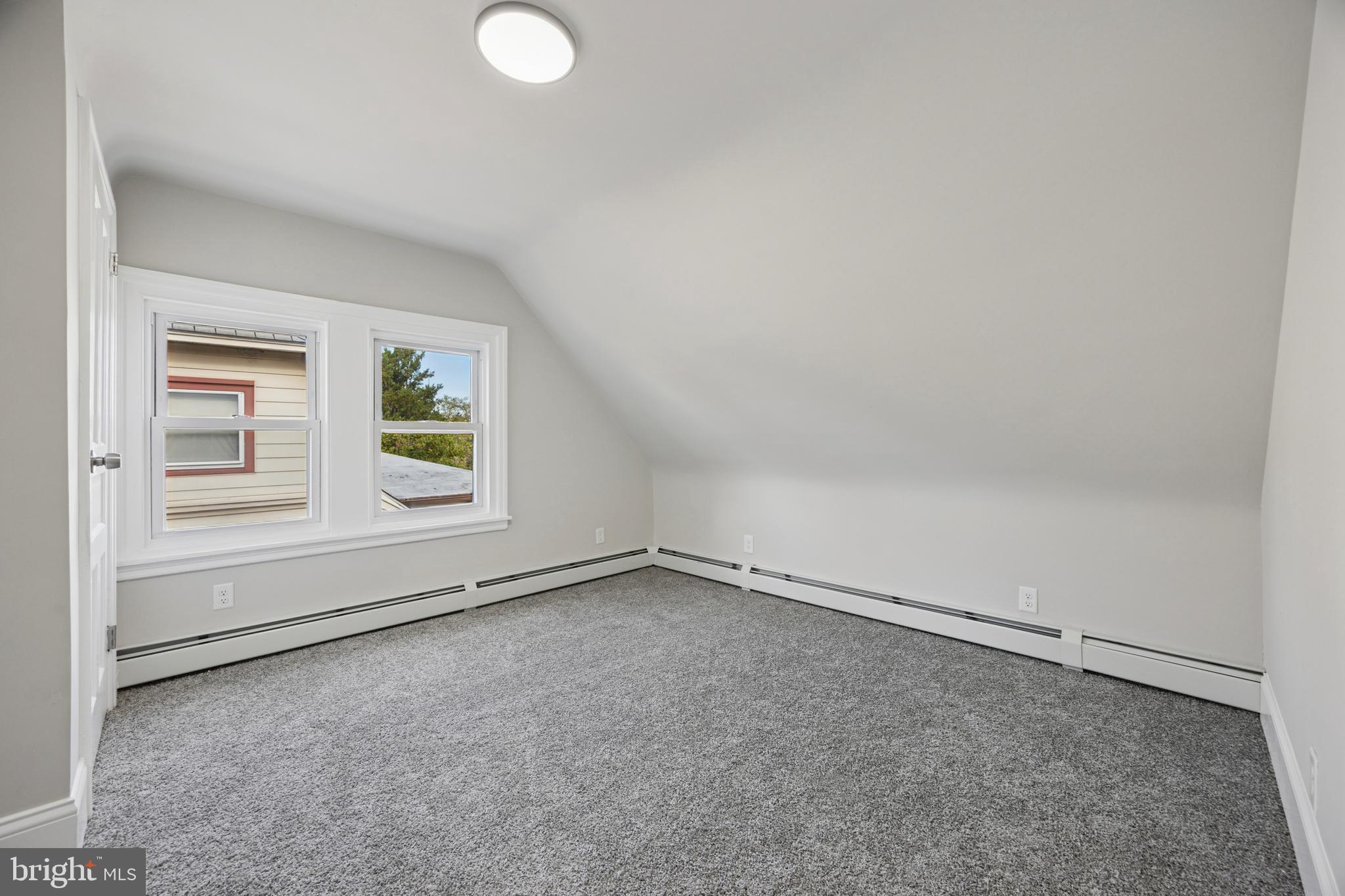 405 North Swarthmore Avenue Ridley Park, PA 19078 - Photo 23 of 35 an empty room with windows