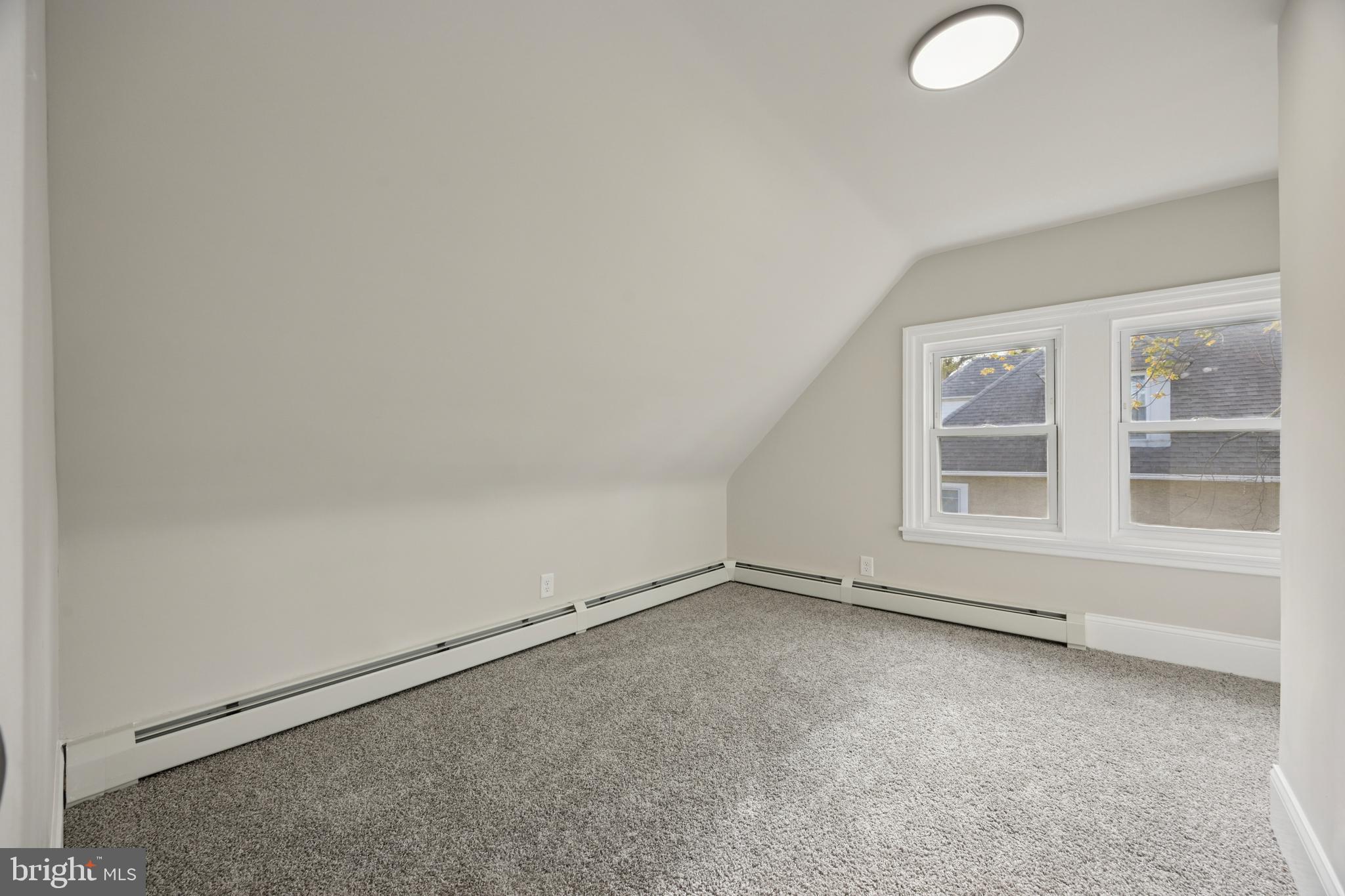 405 North Swarthmore Avenue Ridley Park, PA 19078 - Photo 25 of 35 an empty room with a window