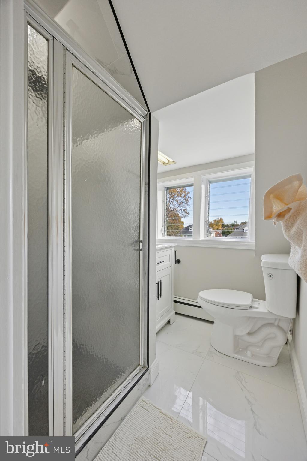 405 North Swarthmore Avenue Ridley Park, PA 19078 - Photo 26 of 35 a bathroom with a toilet shower vanity and a sink