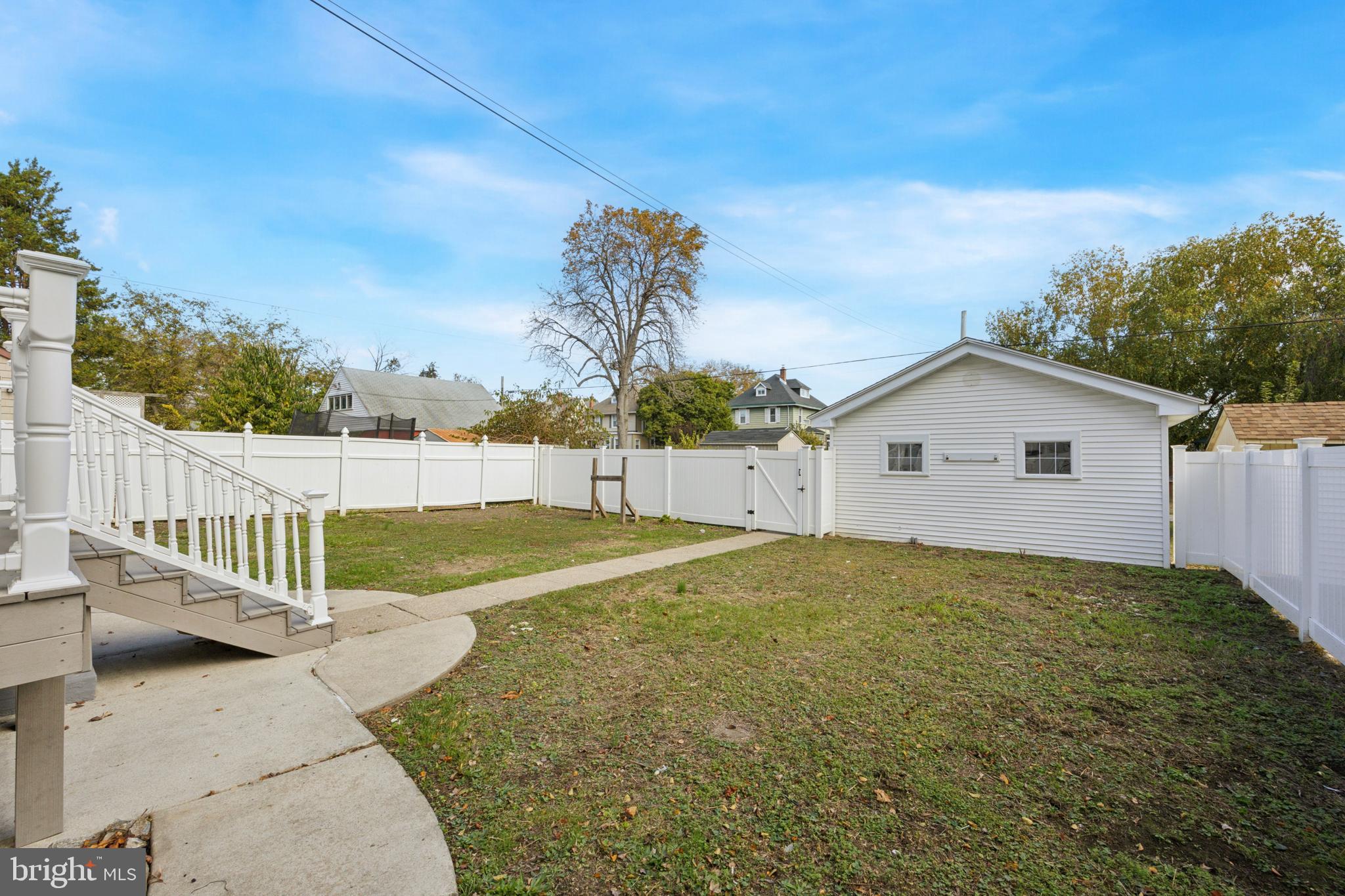 405 North Swarthmore Avenue Ridley Park, PA 19078 - Photo 33 of 35 a view of a house with backyard and trees
