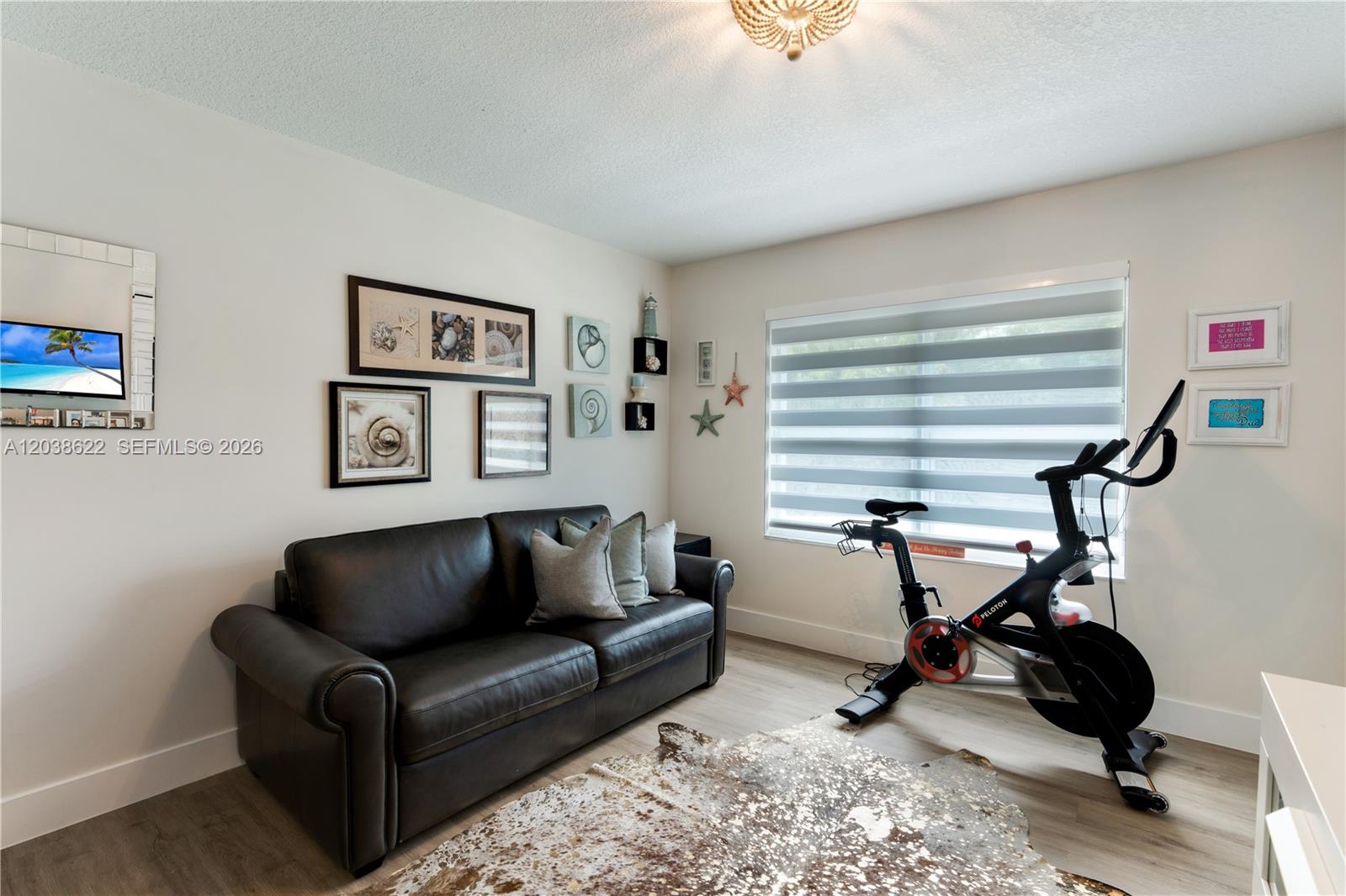 14830 Southwest 149th Street Miami, FL 33196 - Photo 20 of 43 a living room with furniture and a window