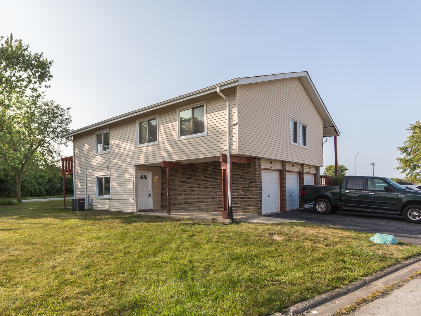 a house view with a garden space
